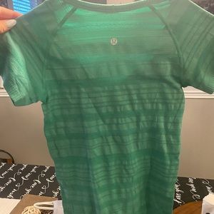 Great condition. Only hand washed and air dried. Green lululemon tee. I have 2!!